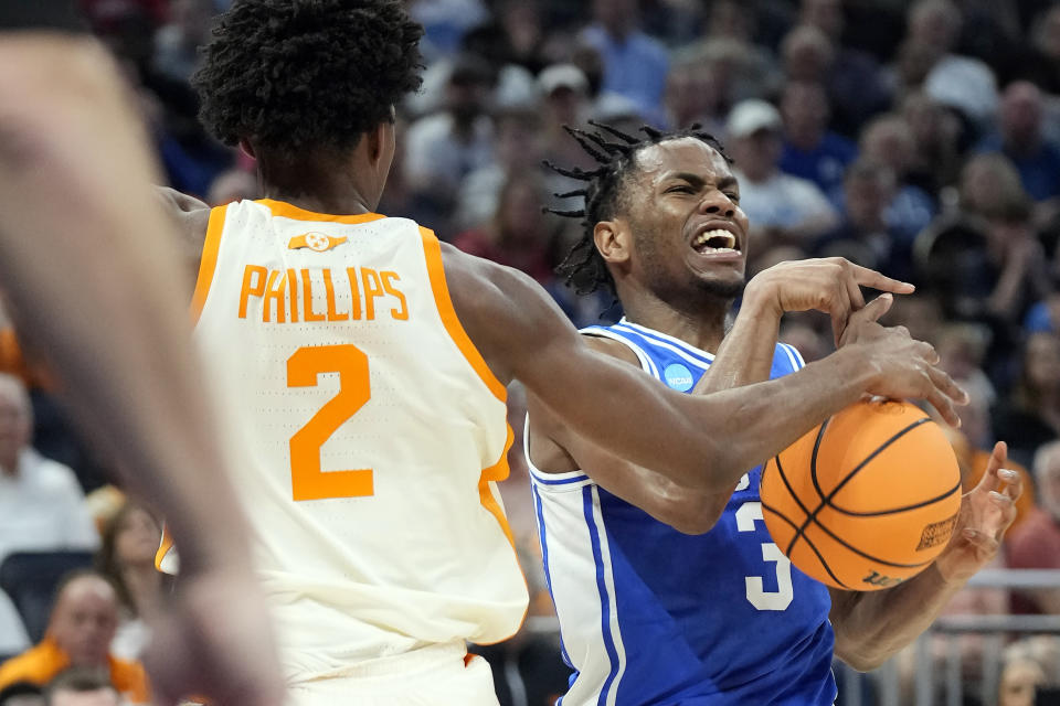Duke guard Jeremy Roach (3) is fouled by Tennessee forward Julian Phillips (2) during the first half of a second-round college basketball game in the NCAA Tournament Saturday, March 18, 2023, in Orlando, Fla. (AP Photo/Chris O'Meara)