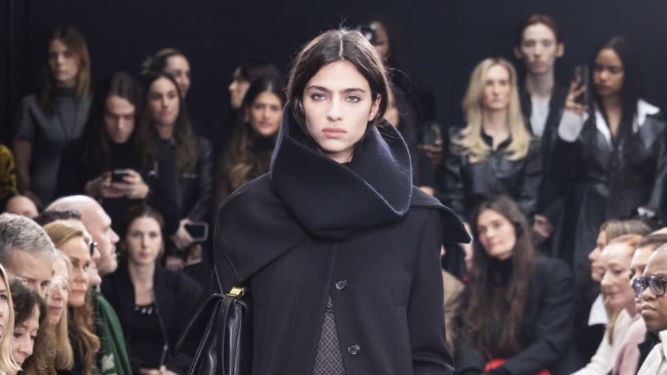 Highlights included tall cowl neck collars, asymmetrical cuts, knit capes and long apron dresses. - Giovanni Giannoni & Monica Feudi, Courtesy of Proenza Schouler