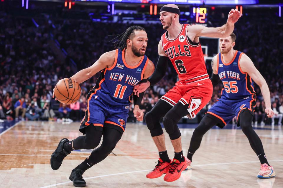 Apr 14, 2024; New York, New York, USA; New York Knicks guard Jalen Brunson (11) drives past Chicago Bulls guard Alex Caruso (6) in the first quarter at Madison Square Garden. Mandatory Credit: Wendell Cruz-USA TODAY Sports
