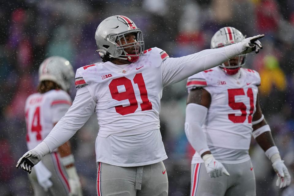 Ohio State defensive tackle Tyleik Williams points to a video replay during the first half of Saturday's game at Northwestern.