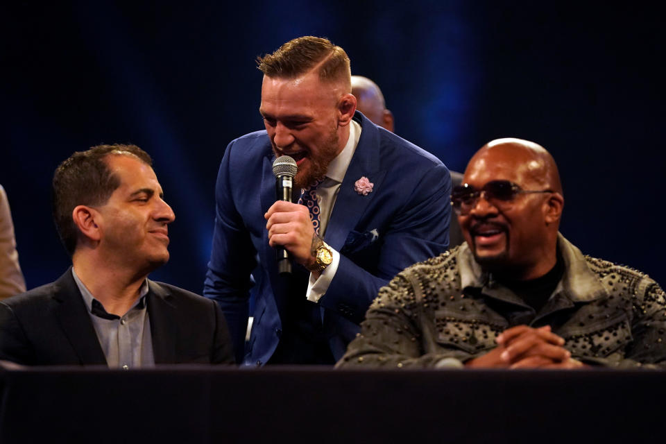 LONDON, ENGLAND - JULY 14:  Conor McGregor (C) taunts Executive VP & General Manager of Showtime Sports Stephen Espinoza (L) during the Floyd Mayweather Jr. v Conor McGregor World Press Tour event at SSE Arena on July 14, 2017 in London, England. (Photo by Jeff Bottari/Zuffa LLC/Zuffa LLC via Getty Images)