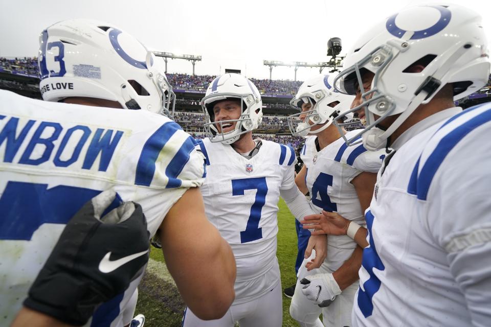 Indianapolis Colts place kicker Matt Gay (7) celebrates with teammates after Gay kicked the game winning field goal during overtime of an NFL football game against the Baltimore Ravens, Sunday, Sept. 24, 2023, in Baltimore. (AP Photo/Julio Cortez)