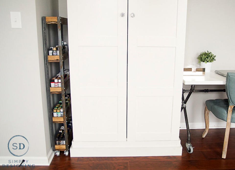 <body> <p>Those narrow spaces in your home, often the result of poor design, eat up usable storage space. All too often, the gap between the TV and the wall or the awkward space between two cabinets are forgotten and unused. To maximize <a rel="nofollow noopener" href=" http://www.bobvila.com/slideshow/20-sneaky-storage-ideas-12281?#.V7xvcJMrIcg?bv=yahoo" target="_blank" data-ylk="slk:storage;elm:context_link;itc:0;sec:content-canvas" class="link ">storage</a> in the smallest of spots, create a thin rolling cart that can easily slide in and out of tiny corners. It's as simple as that to find extra space for spices in the kitchen or craft supplies in the family room. </p> <p><strong>Related: <a rel="nofollow noopener" href=" http://www.bobvila.com/slideshow/get-organized-25-clever-ideas-for-repurposed-storage-5752?#.V7xvcZMrIcg?bv=yahoo" target="_blank" data-ylk="slk:Get Organized: 25 Clever Ideas for Repurposed Storage;elm:context_link;itc:0;sec:content-canvas" class="link ">Get Organized: 25 Clever Ideas for Repurposed Storage</a> </strong> </p> </body>