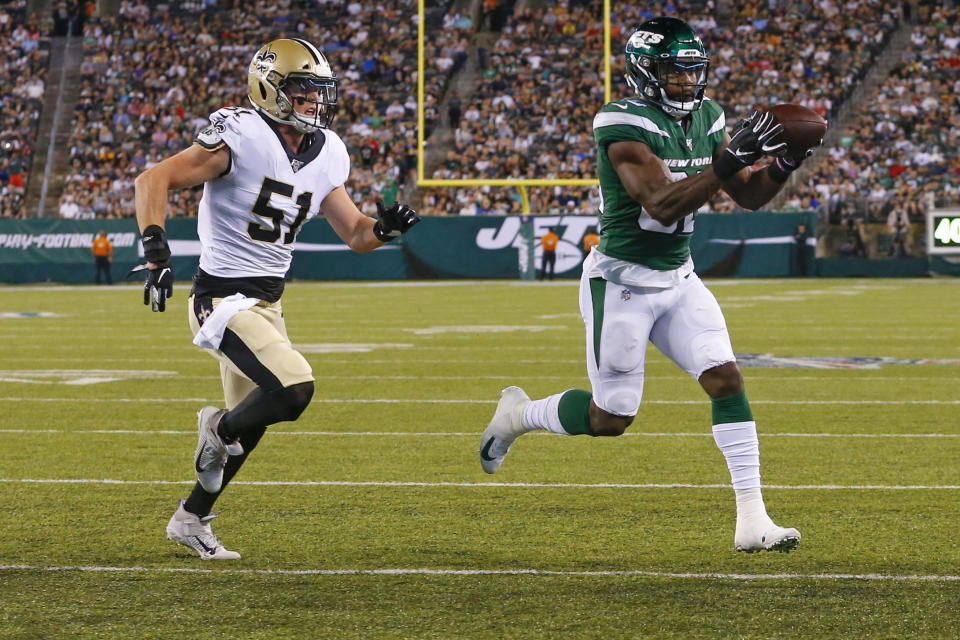 New York Jets' Ty Montgomery (88) runs away from New Orleans Saints' Colton Jumper (51) for a touchdown during the first half of a preseason NFL football game Saturday, Aug. 24, 2019, in East Rutherford, N.J. (AP Photo/Noah K. Murray)