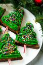 <p>Let your children's imaginations run wild decorating these chocolatey trees.</p><p><strong>Get the recipe at <a href="https://www.dinneratthezoo.com/christmas-tree-brownies/" rel="nofollow noopener" target="_blank" data-ylk="slk:Dinner at the Zoo;elm:context_link;itc:0;sec:content-canvas" class="link ">Dinner at the Zoo</a>.</strong> </p>