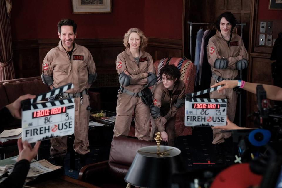 From left, Paul Rudd, Carrie Coon, Mckenna Grace and Finn Wolfhard, a new generation of ghostbusters, on the set of “Ghostbusters: Frozen Empire.” Jaap Buitendijk/Columbia Pictures