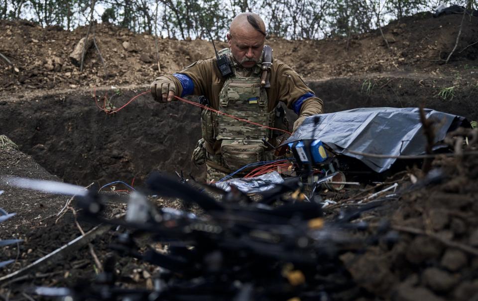 Ukrainian drone pilots prepare for a combat flight in Kharkiv region