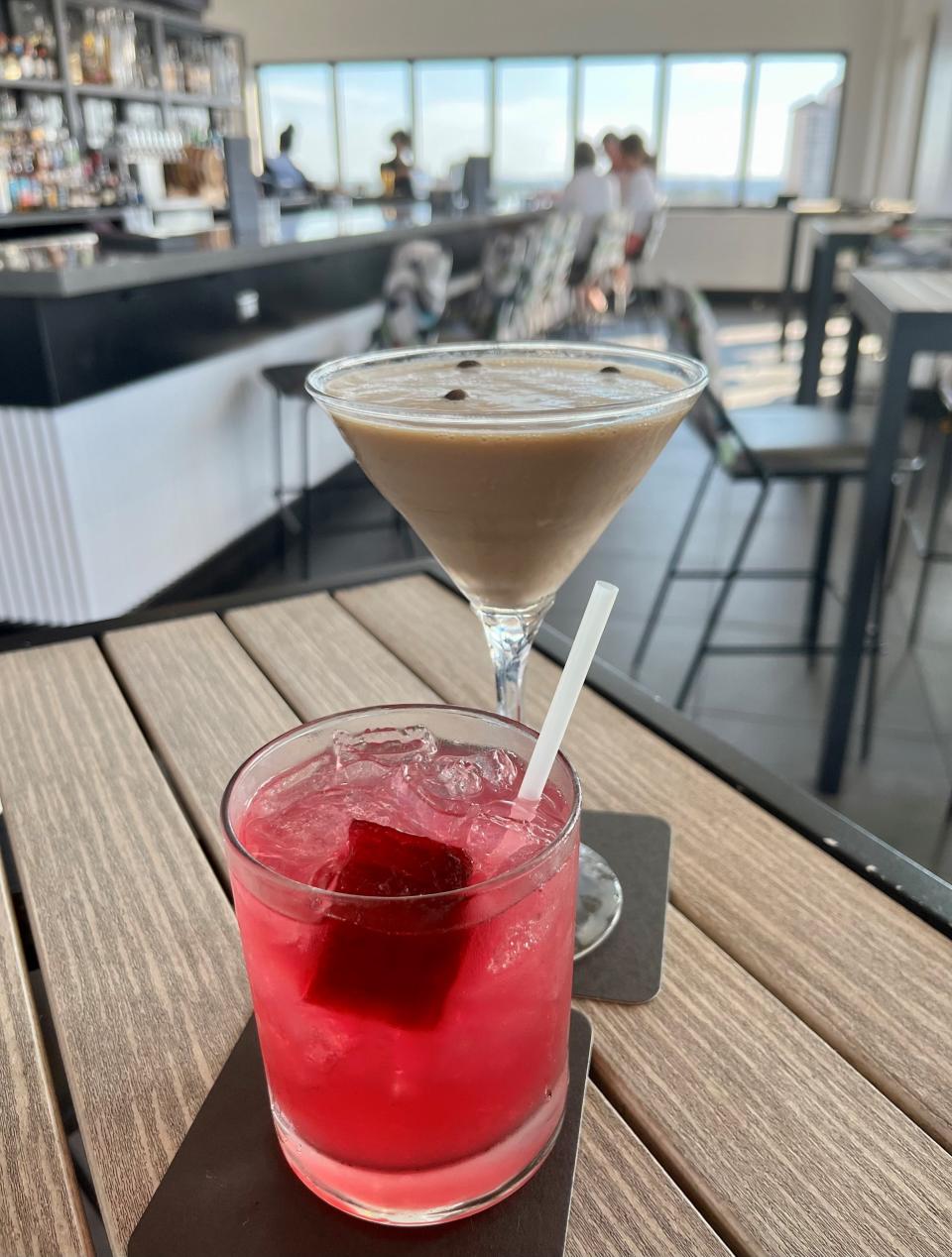 Go to Beacon Social Drinkery in downtown Fort Myers for the views and stay for the drinks. Pictured: Raspberry vodka and lemonade based The Beacon and the Mr. Dean's Martini with double espresso vodka, Baileys and Kahlua.