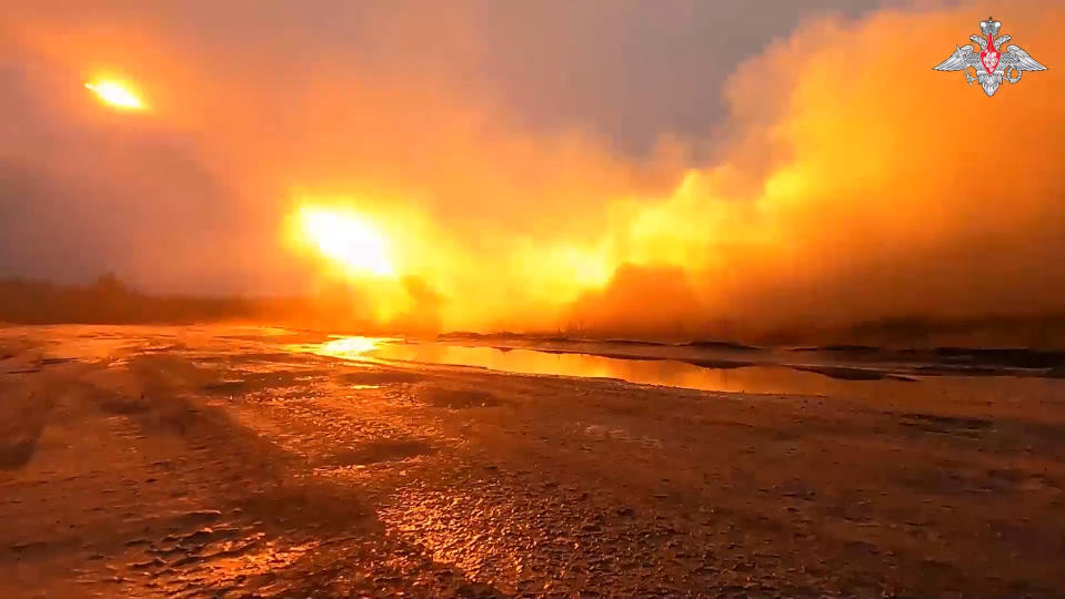 This handout photo taken from video released by the Russian Defense Ministry Press Service on Thursday, Dec. 14, 2023, shows the Russian military's Grad multiple rocket launcher firing at Ukrainian troops at an undisclosed location. After blunting Ukraine's counteroffensive from the summer, Russia is building up its resources for a new stage of the war in the winter, which could involve trying to extend its gains in the east and deal significant blows to the country's vital infrastructure. Russia has ramped up its pressure on Ukrainian forces on several parts of the more than 1,000-kilometer (620-mile) front line. (Russian Defense Ministry Press Service photo via AP)