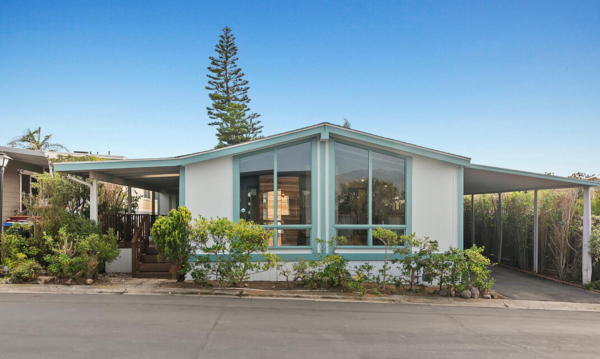 Dating from the early 1970s, the existing mobile home was a double-wide that hadn't been modernized when Jeff and Cándida bought it.