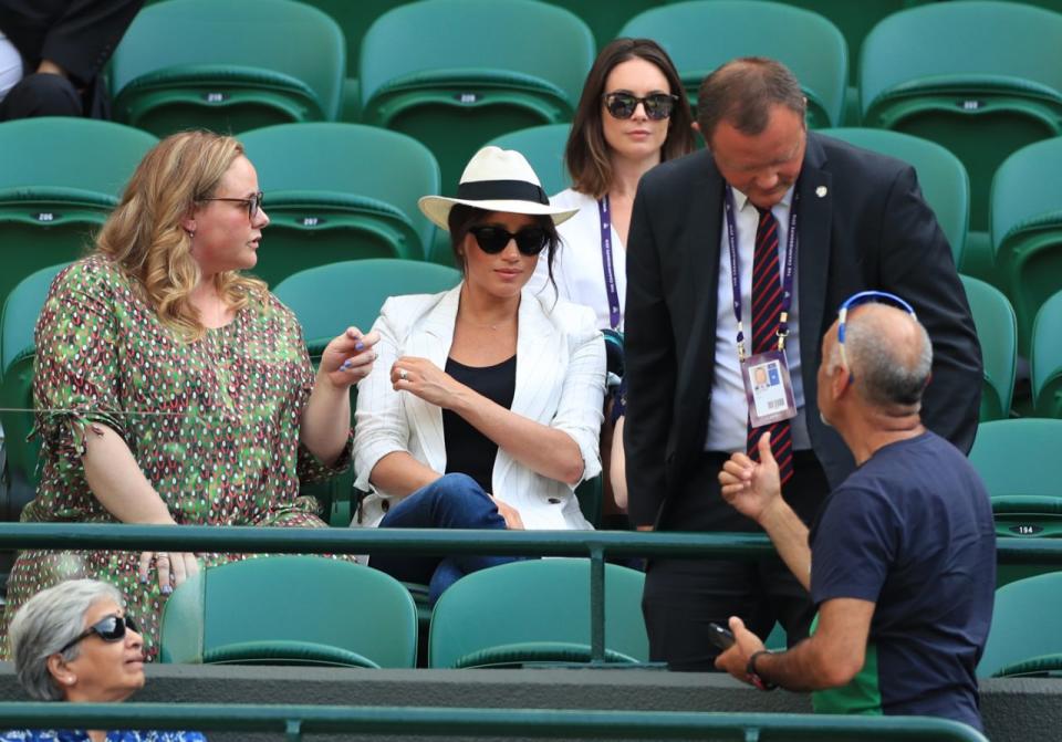 Meghan copped criticism after her security asked a spectator taking a selfie at Wimbledon not to do so. Photo: Getty 