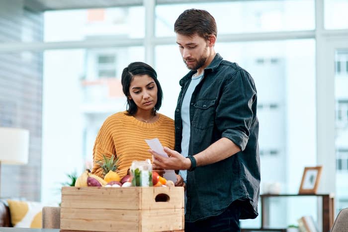 Couple looking at receipts together