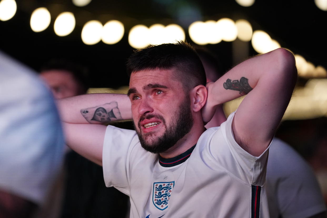 An England fan in tears at Luna Springs in Birmingham watching the UEFA Euro 2020 Final between Italy and England. Picture date: Sunday July 11, 2021.