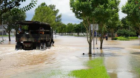 Emergency crews patrol Fort Bend County after heavy rainfall caused the Brazos River to surge to its highest level causing flooding outside Houston, Texas, in this picture taken June 1, 2016, courtesy of the Fort Bend County Sheriff's Office. Fort Bend County Sheriff's Office/Handout via REUTERS