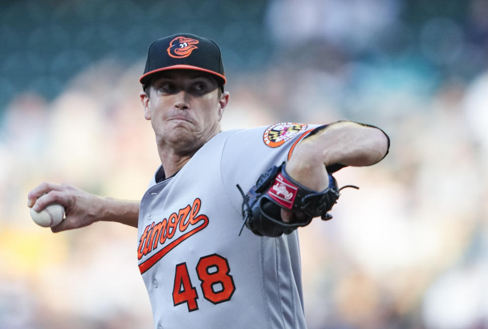 Baltimore Orioles starting pitcher Kyle Gibson throws against the Seattle Mariners during the first inning of a baseball game Friday, Aug. 11, 2023, in Seattle. (AP Photo/Lindsey Wasson)