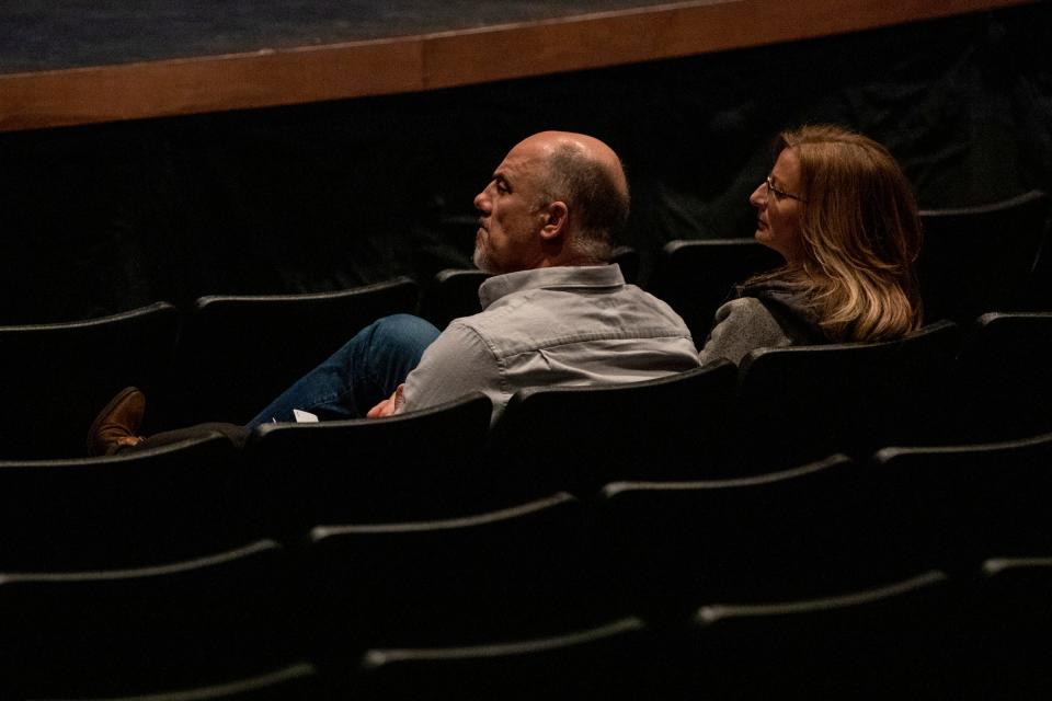 Audience members listen during the donation distribution plan town hall at the Oxford High School Auditorium in Oxford on Monday March 21, 2022. The fund will be distributed to those affected by the Nov. 30, 2021 shooting.