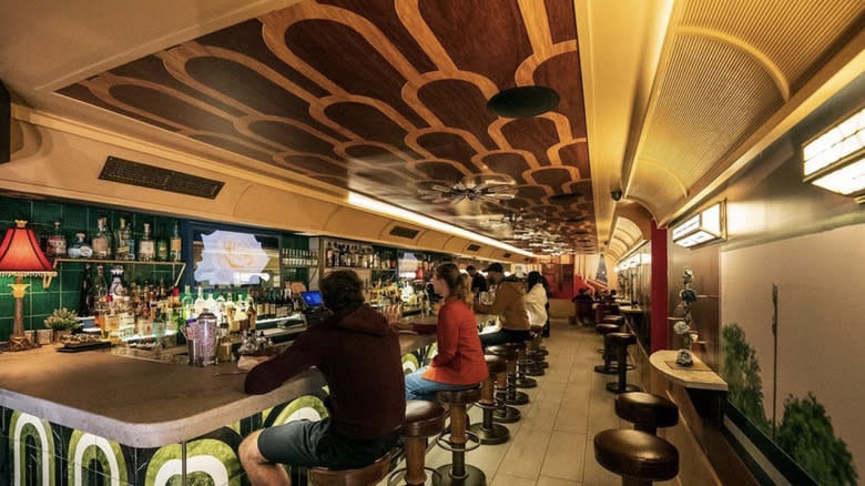 Dolly Varden bar and wooden ceiling