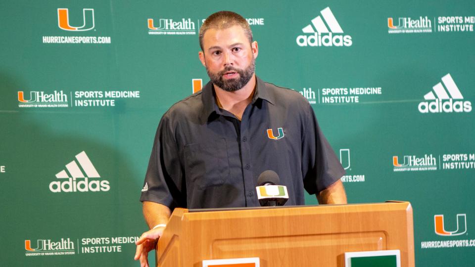 Miami defensive coordinator Blake Baker speaks to the media in 2019 in Coral Gables, Fla.