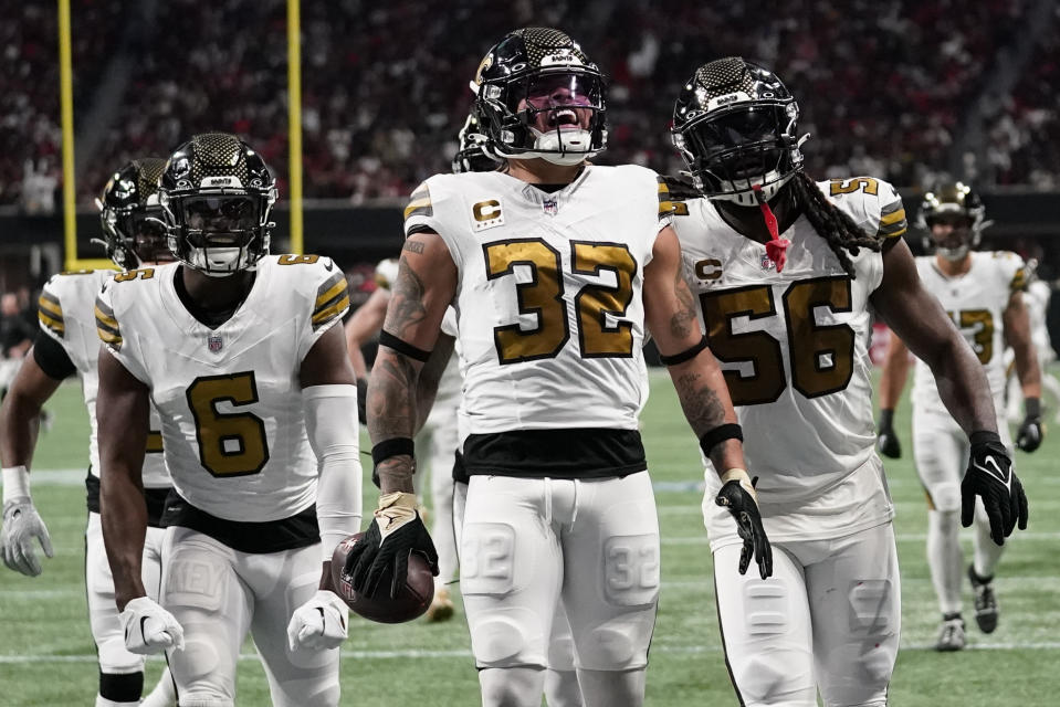 New Orleans Saints safety Tyrann Mathieu (32) celebrates an interception against the Atlanta Falcons during the second half of an NFL football game, Sunday, Nov. 26, 2023, in Atlanta. (AP Photo/Brynn Anderson)