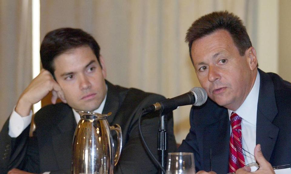 Developer Sergio Pino responds to a question at the A Free Market Cuba, Post Castro Conference as Florida legislator Marco Rubio looks on in October 2005.