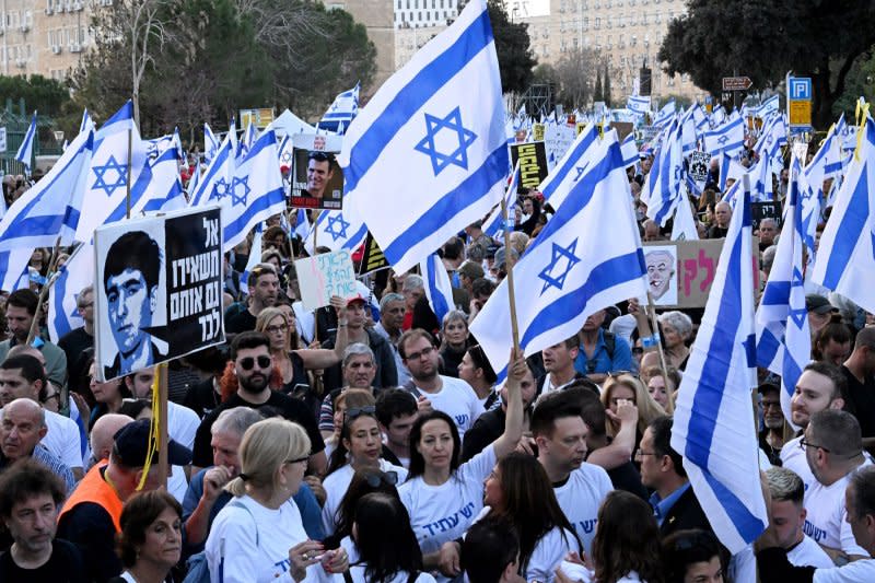 Tens of thousands of Israeli protesters attend a demonstration outside the Knesset, or Israeli Parliament, calling for Prime Minister Benjamin Netanyahu to resign, early elections, the release of hostages and the cancellation of the Knesset recess on Sunday. Photo by Debbie Hill/ UPI