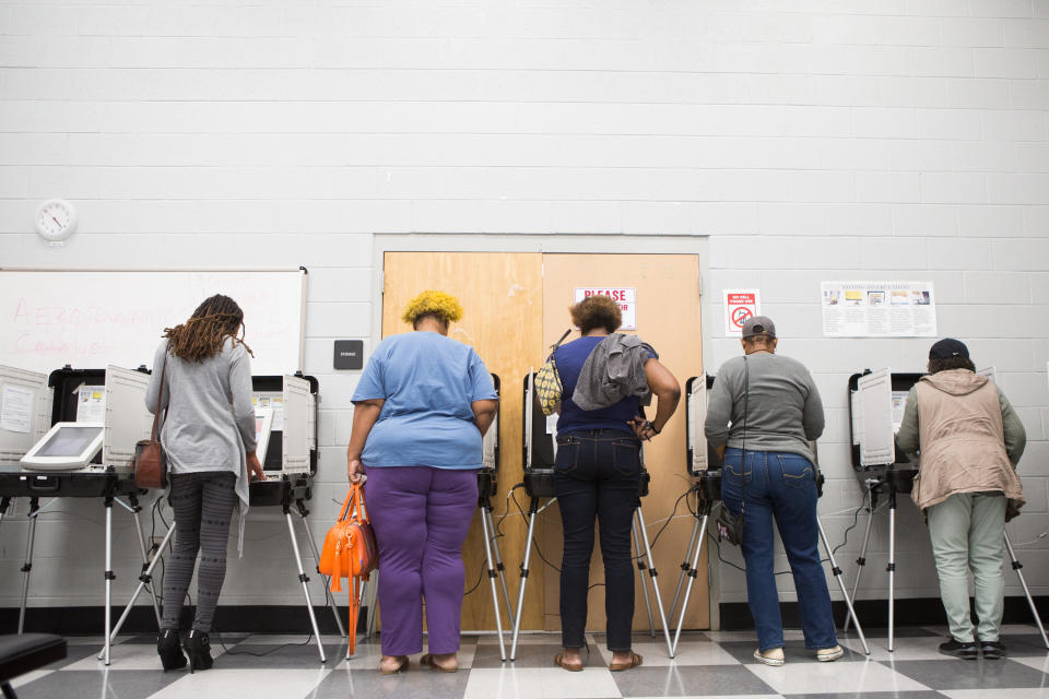 Voters cast ballots during the early voting period in Atlanta last month. (Photo: Jessica McGowan/Getty Images)