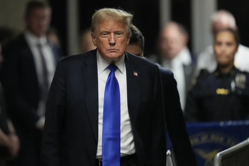 Former President Donald Trump walks to make comments to members of the media after a jury convicted him of felony crimes for falsifying business records in a scheme to illegally influence the 2016 election, at Manhattan Criminal Court, Thursday, May 30, 2024, in New York. (AP Photo/Seth Wenig, Pool)