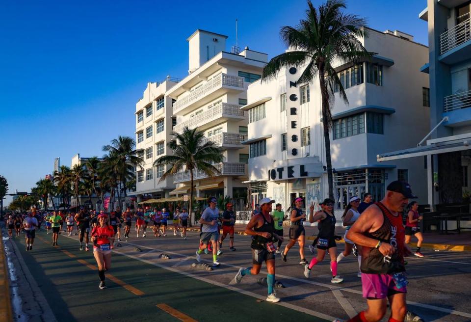 Runners make they way south on Ocean Drive before heading west towards Miami during the Life Time Miami Marathon on Sunday, January 28, 2024 in Miami, Florida