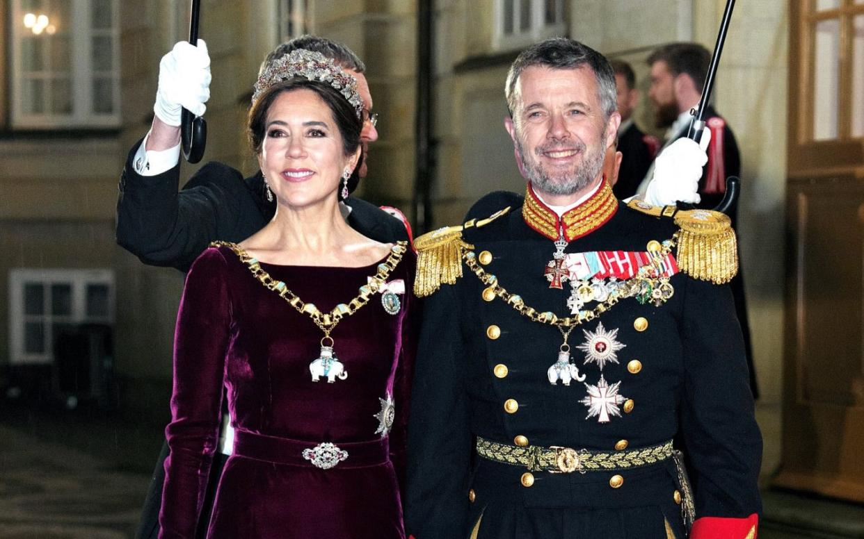 Crown Prince Frederik and Crown Princess Mary arrive at the New Year's banquet at Amalienborg Castle, Copenhagen