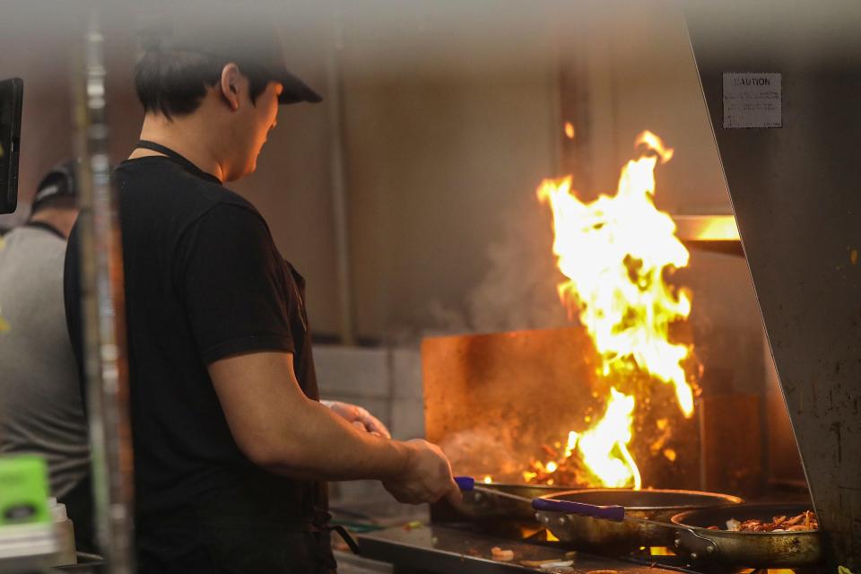 A chef at work at Noori Pocha.