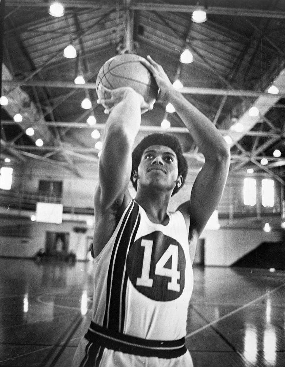 Marquette University basketball guard Dean "The Dream" Meminger seen in a 1969 Journal Sentinel archive photo. Meminger's number 14 jersey is retired.