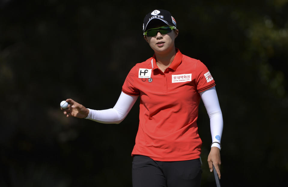 Hyo Joo Kim, of South Korea, acknowledges the crowd after a birdie putt on the 18th green during the final round of the Kia Classic LPGA golf tournament Sunday, March 31, 2019, in Carlsbad, Calif. (AP Photo/Orlando Ramirez)