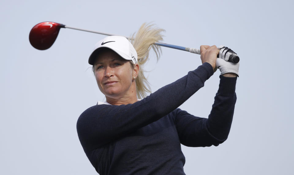 Suzann Pettersen, of Norway, watches her tee shot on the seventh green during the first round of the North Texas LPGA Shootout golf tournament at the Las Colinas Country Club in Irving, Texas, Thursday, May 1, 2014. (AP Photo/LM Otero)