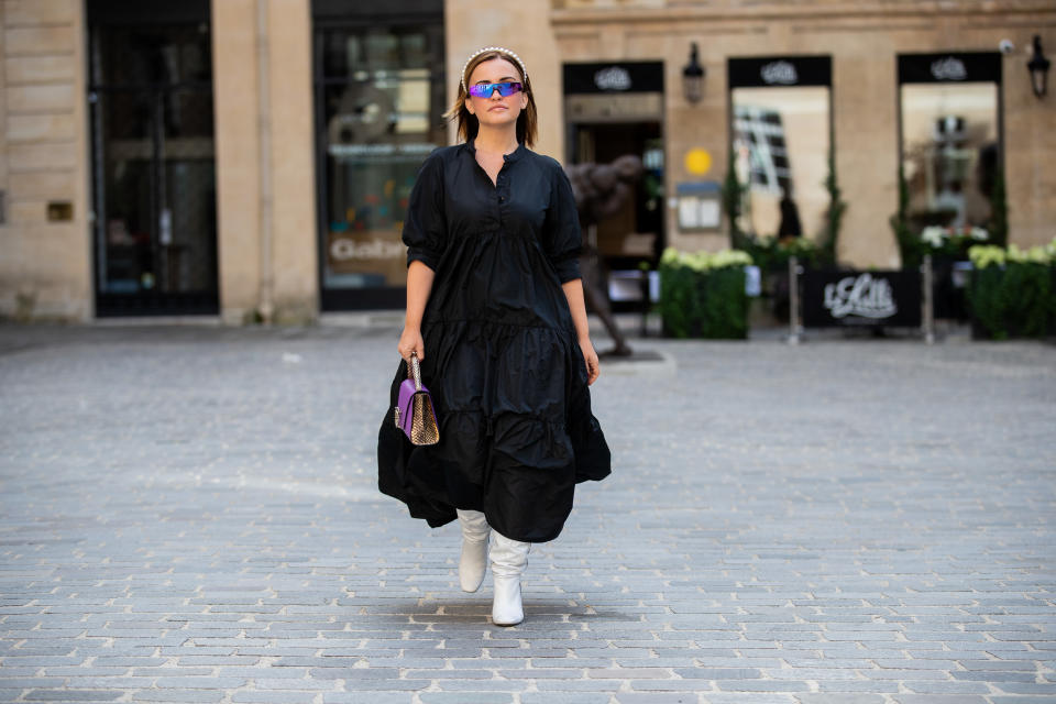 PARIS, FRANCE - SEPTEMBER 30: Carolina Ogliaro seen wearing Balenciaga cycle sunglasses, black Zara dress, purple Magrì bag during Paris Fashion Week Womenswear Spring Summer 2020 on September 30, 2019 in Paris, France. (Photo by Christian Vierig/Getty Images)