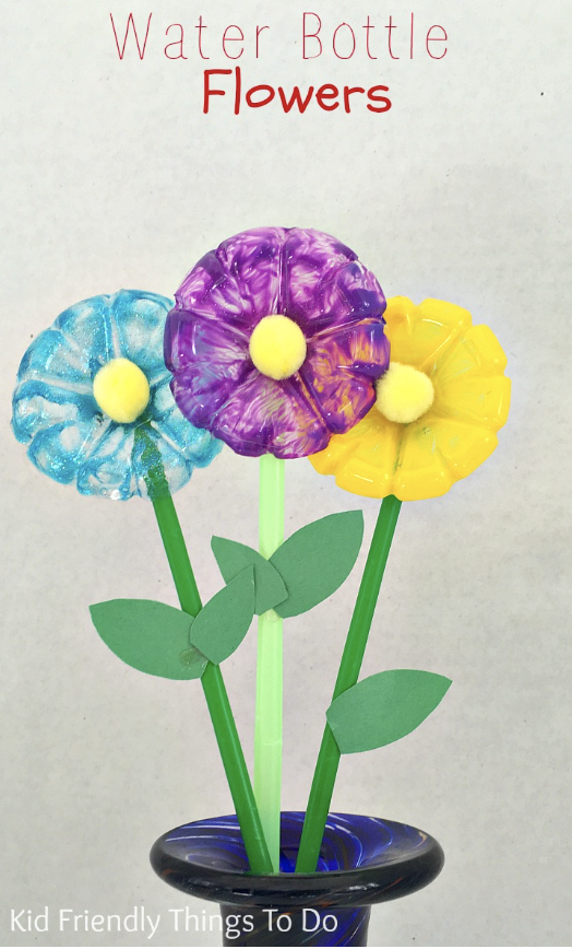 crafts for kids, flowers made with painted water bottles and pom poms