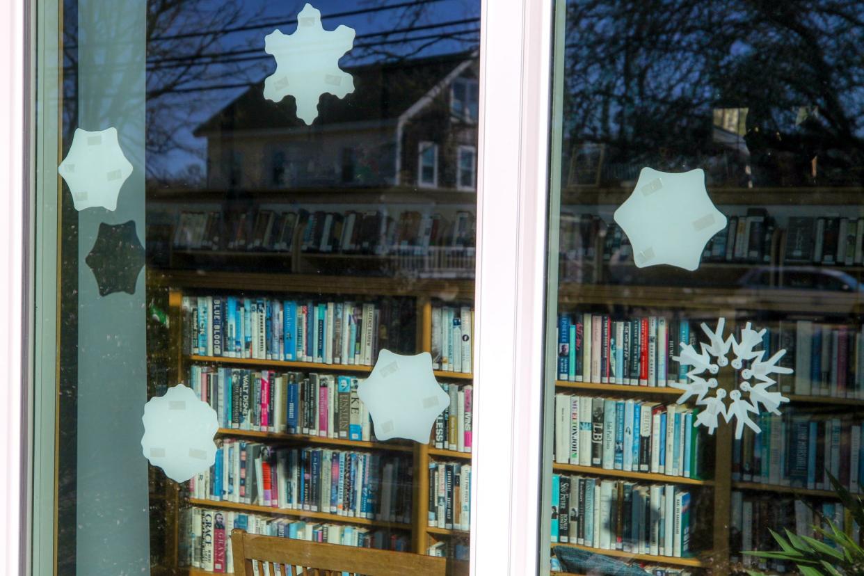 The  Cross' Mills Public Library in Charlestown, where Martin Luther King Jr. Day celebration drew children of all ages who colored snowflakes to brighten the place up.