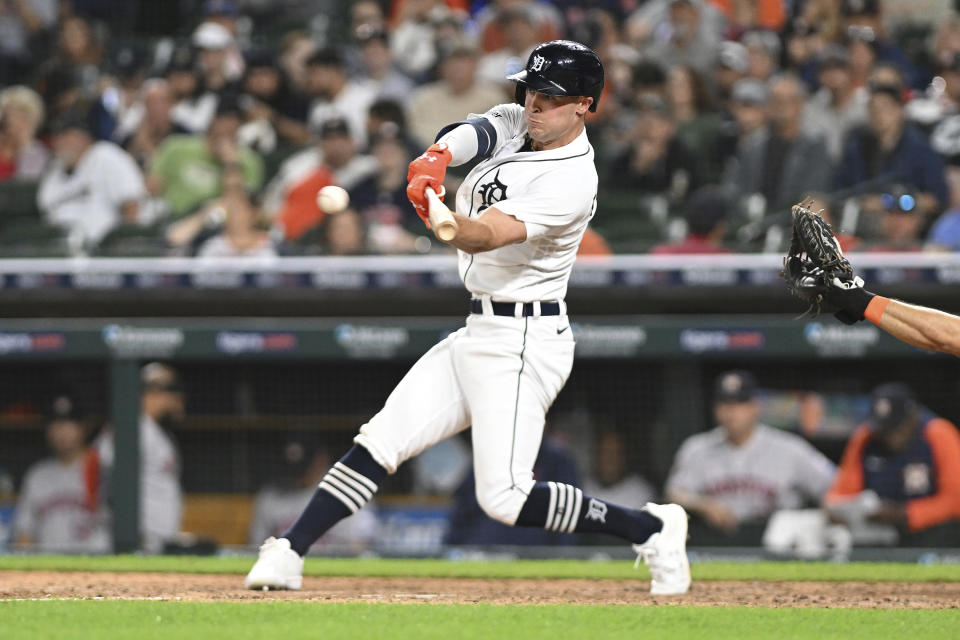 Detroit Tigers designated hitter Kerry Carpenter (30) hits a single against the Houston Astros in the eighth inning of a baseball game, Saturday, Aug. 26, 2023 in Detroit. (AP Photo/Lon Horwedel)