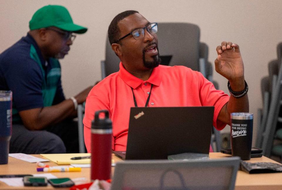 Social Worker William Matthews asks a question during a class on Permanency Planning at Wake County Health and Human Services on Monday, June 24, 2024 in Raleigh, N.C. Social workers like Williams are tasked with helping children who have been abused or neglected find the care they need while families work toward reunification or adoption.