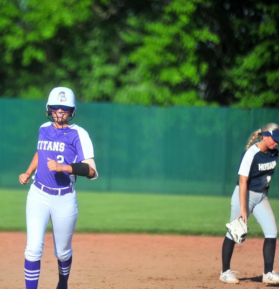 Hanna Massaro is all smiles after hitting a three-run home run to give Triway a 5-1 lead.