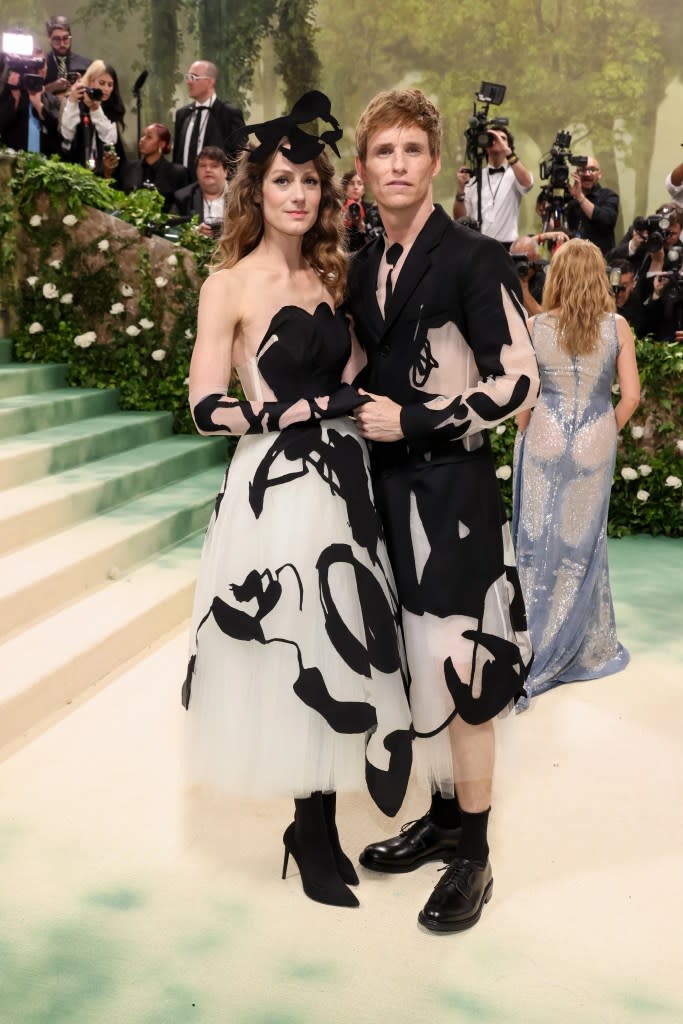 Hannah Bagshawe and Eddie Redmayne attend The 2024 Met Gala Celebrating "Sleeping Beauties: Reawakening Fashion" at The Metropolitan Museum of Art on May 06, 2024 in New York City.