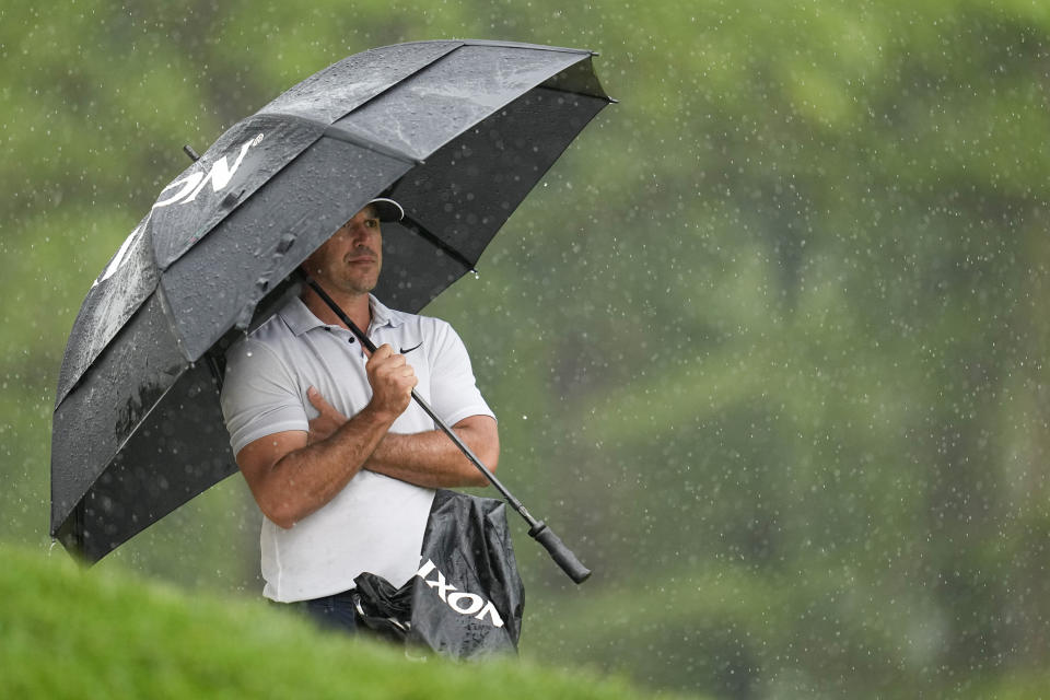 Brooks Koepka waits to play on the 16th hole during the third round of the PGA Championship golf tournament at Oak Hill Country Club on Saturday, May 20, 2023, in Pittsford, N.Y. (AP Photo/Abbie Parr)