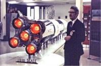 Jesco von Puttkamer, a NASA engineer instrumental in the development of the Saturn V rocket booster seen here with a model of the rocket, died Dec. 27 at 79 after a brief illness.