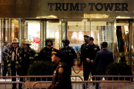 FILE PHOTO - Police and fire crew stand outside Trump Tower following a report of a suspicious package in Manhattan, New York City, U.S. on December 27, 2016. REUTERS/Andrew Kelly/File Photo