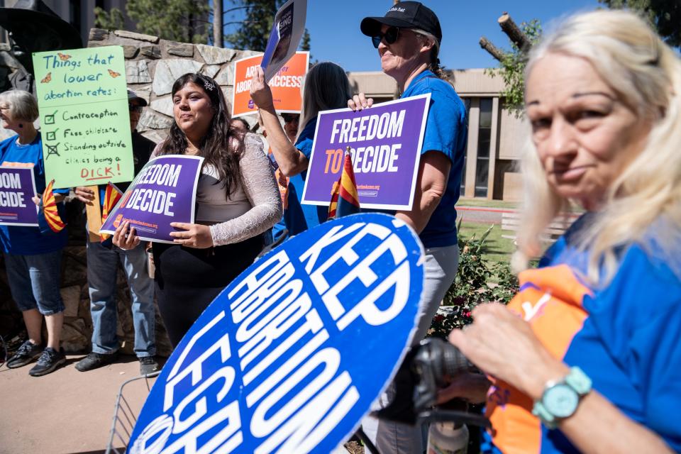 Abortion rights activists attend a news conference addressing the Arizona Supreme Court's ruling to uphold a 160-year-old near-total abortion ban at the Arizona state Capitol in Phoenix on April 9, 2024.