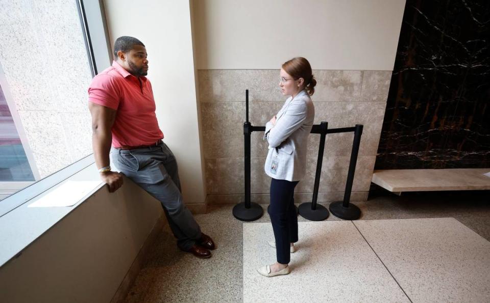 Kevin Spruill talks with his attorney, Molly O’Neil, after his case was dismissed Aug. 24, months after he was detained twice on a warrant that should have been recalled in the state’s electronic court system. Spruill is one of several plaintiffs who signed onto a potential class action lawsuit filed in federal courts alleging that the rollout of the state’s eCourt system violated their civil rights.