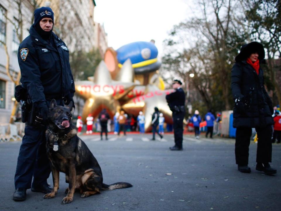 An NYPD officer stands by (AP)