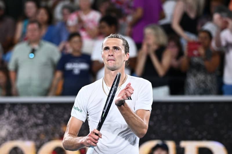 German tennis player Alexander Zverev celebrates defeating Germany's Dominik Koepfer during their men's singles first round tennis match of the 2024 Australian Open at Melbourne Park. Joel Carrett/AAP/dpa