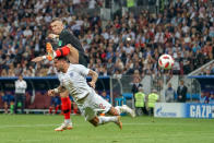 <p>Ivan Perisic of Croatia beats Kyle Walker to the cross with a high foot scoring for 1-1 in the 68th minute (photo by Ulrik Pedersen/Action Plus via Getty Images) </p>