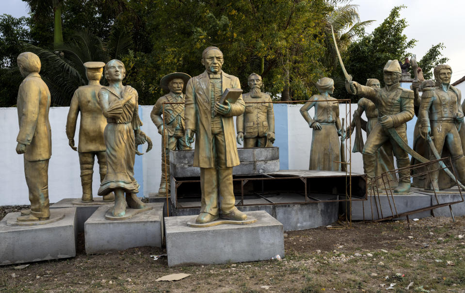 Statues of Mexican independence heroes that are used for the annual holiday stand on the side of the road in Merida, Mexico, Saturday, March 9, 2024. Mexican President Andrés Manuel López Obrador has connected with Mexico's long-invisible working class in a way few leaders have in recent history. (AP Photo/Rodrigo Abd)