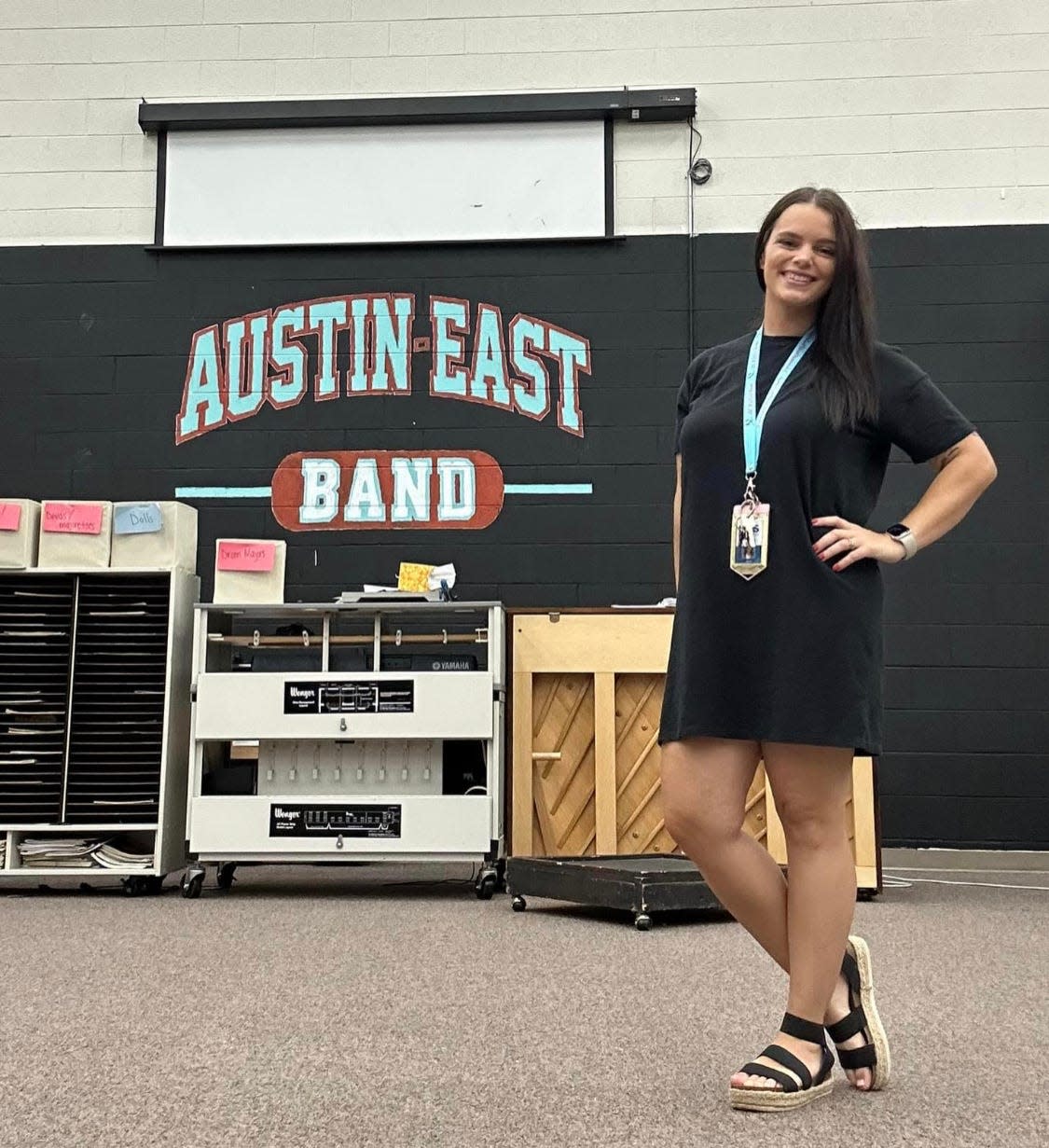 The Austin-East Marching Roadrunners got Alyx Blumenstock −  a veritable dynamo − as their new director, and then got a big surprise Oct. 24 when Ray Huffaker of the Rusty Wallace car dealerships presented them with a check for $30,000.